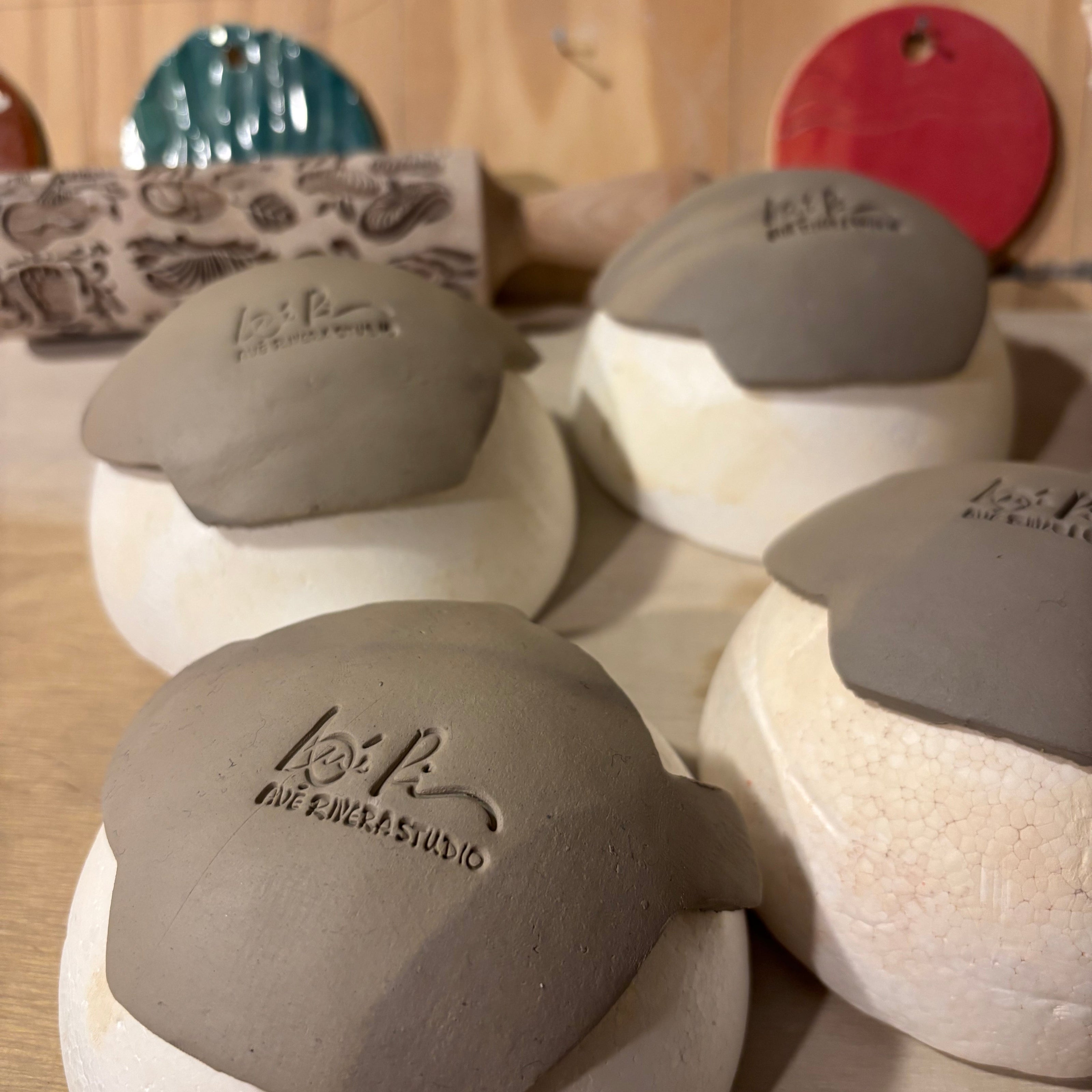 ceramic trinket dishes drying on spherical molds