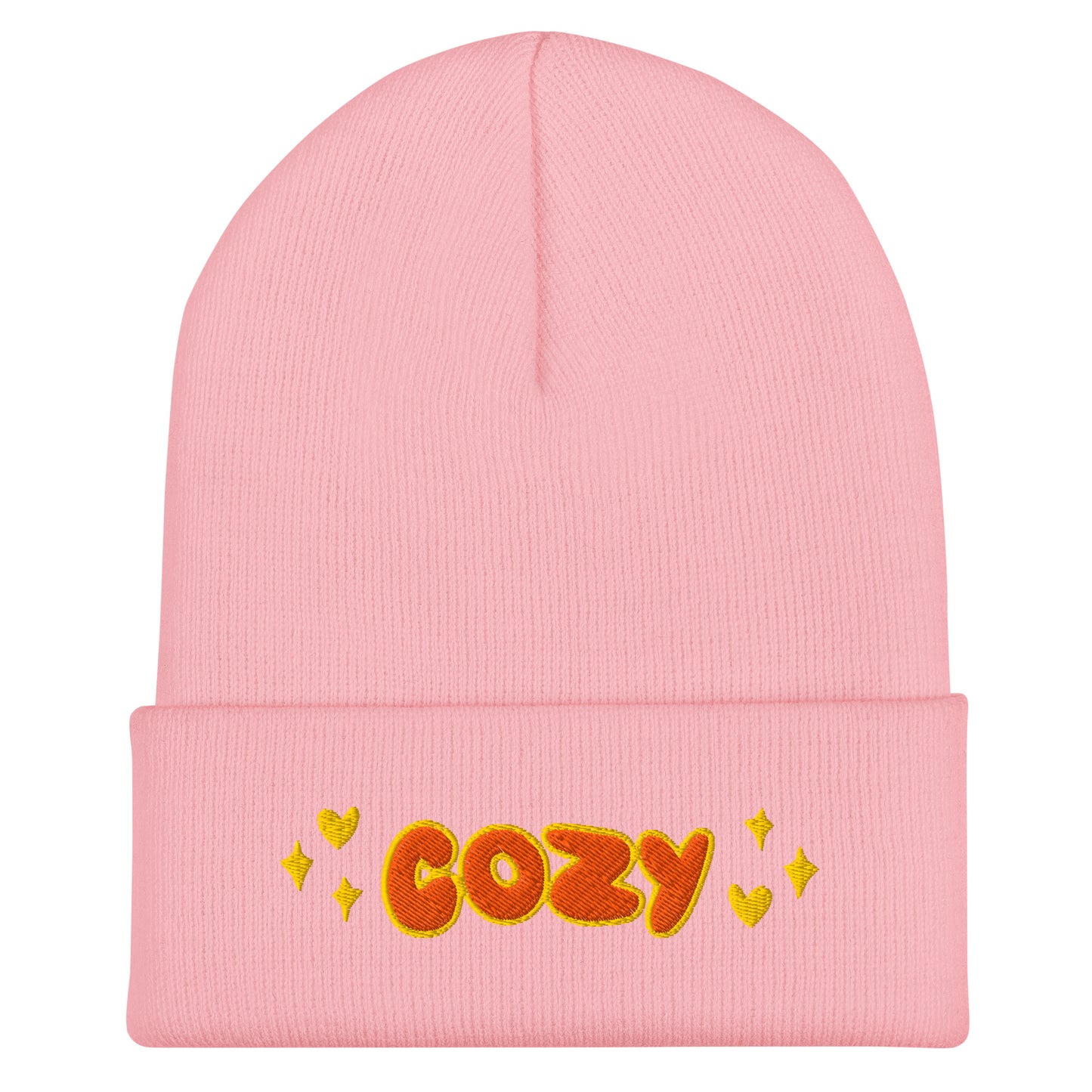 pink beaie that says cozy in orange bubble letters